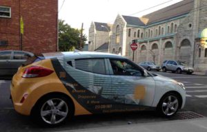 Car vinyl wrap advertising KNAM Media